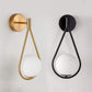 Infinite Brass and Sphere Sconce